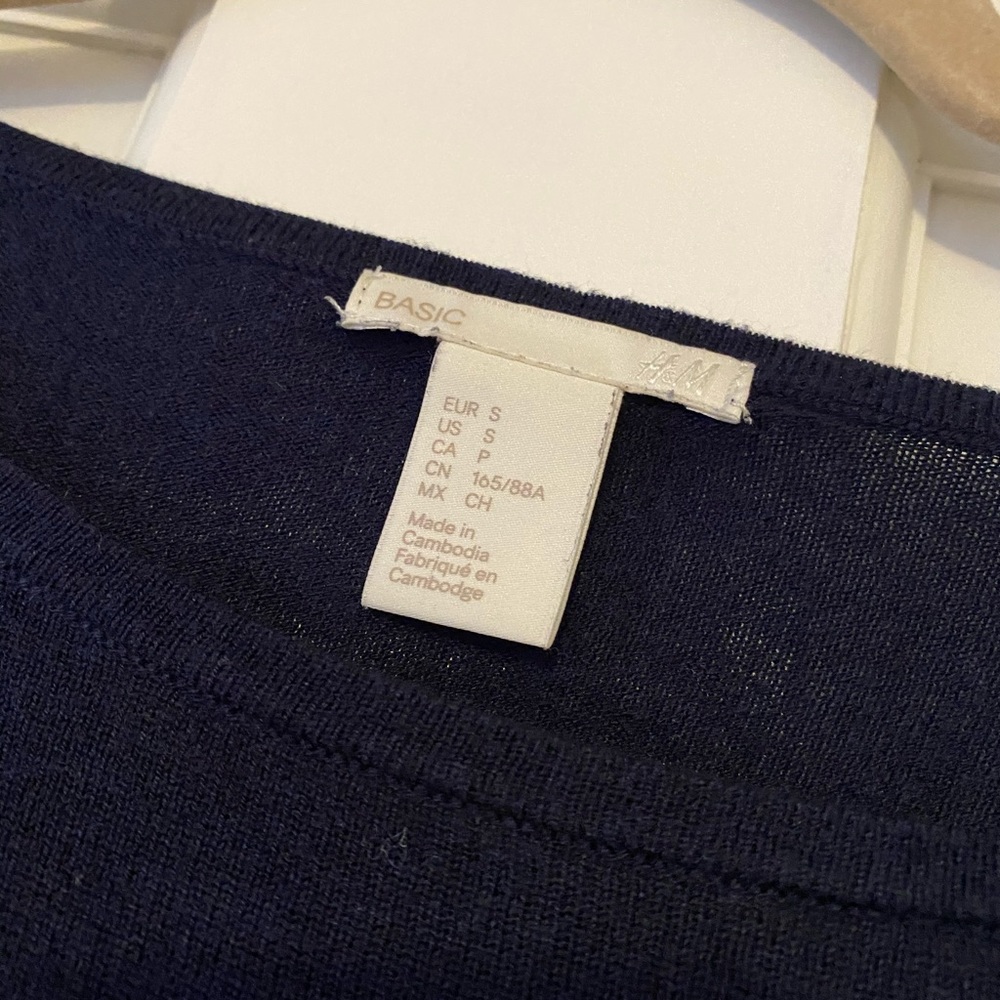 Navy blue sweater.